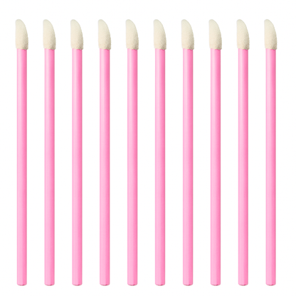 Applicateur rose, lotion autobronzante, précision visage & corps